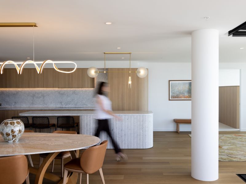 woman walking through apartment